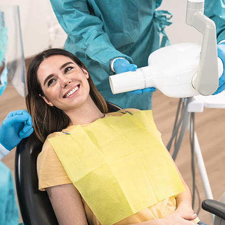 Smiling woman in the dental chair